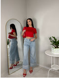 JEANS CON RISVOLTO